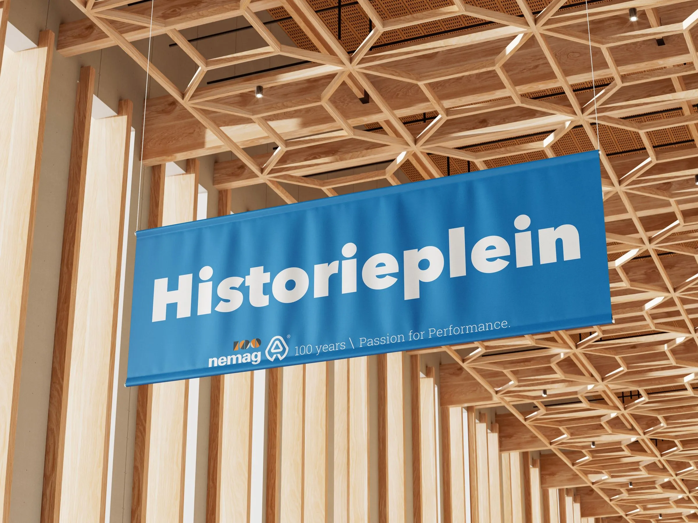 Hangende banner “Historieplein” voor Nemag
