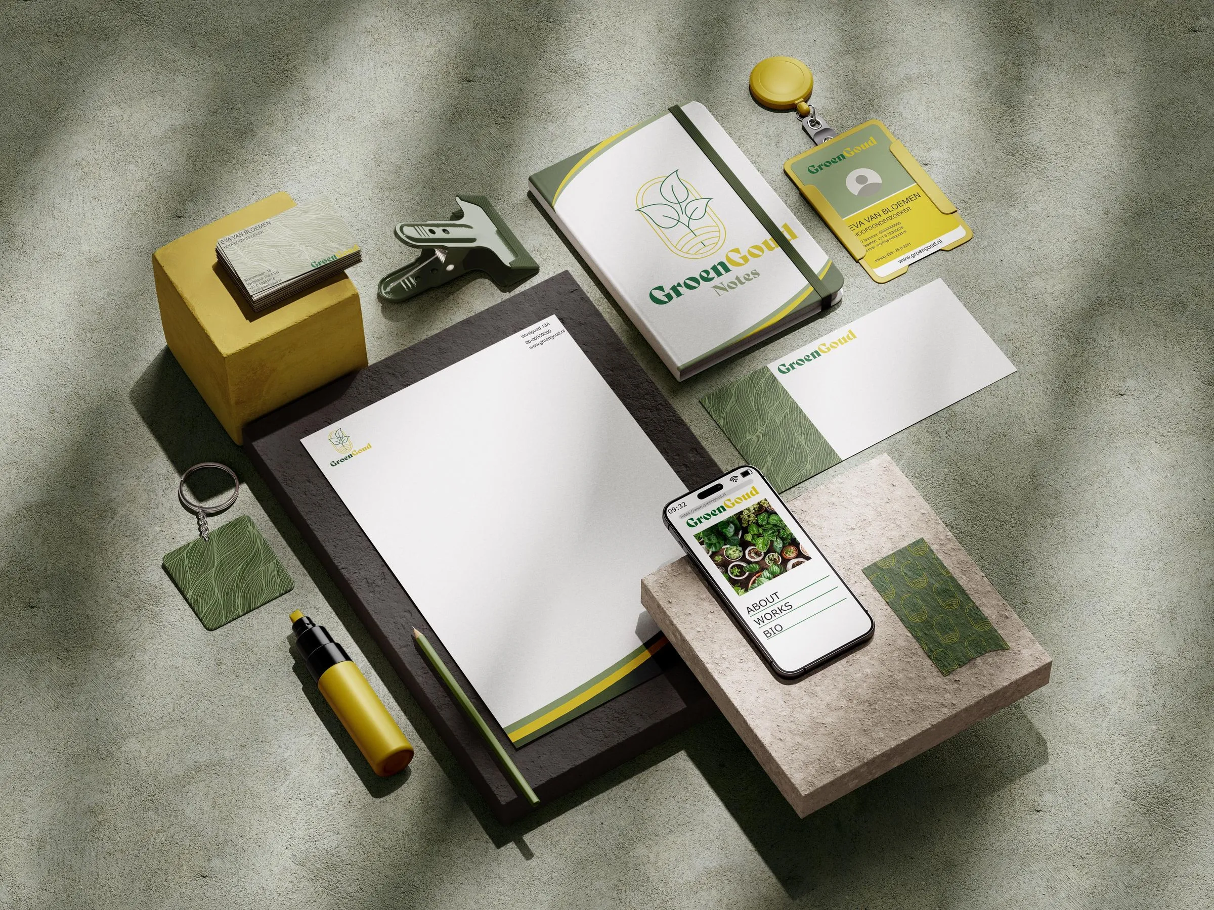 Huisstijl-mockup voor GroenGoud: briefpapier, notitieboek, badge en telefoon